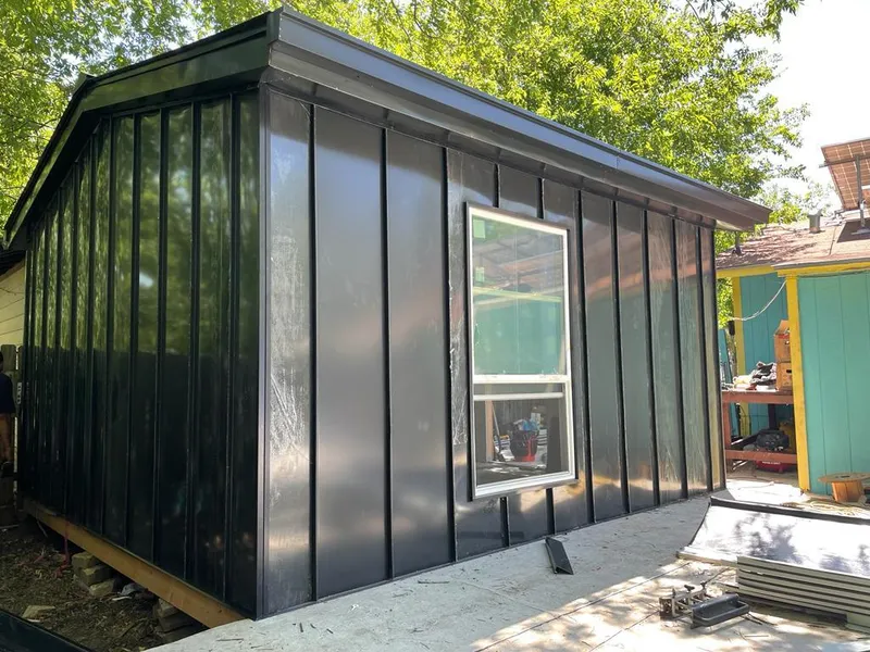 Black standing seam metal wall panels for Roof Inspection in Niceville