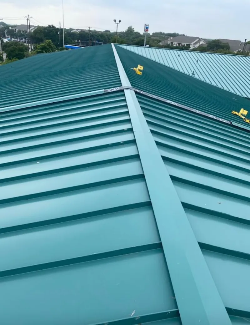 Green commercial metal roof ridge and valley for Metal Roof Repair in Niceville